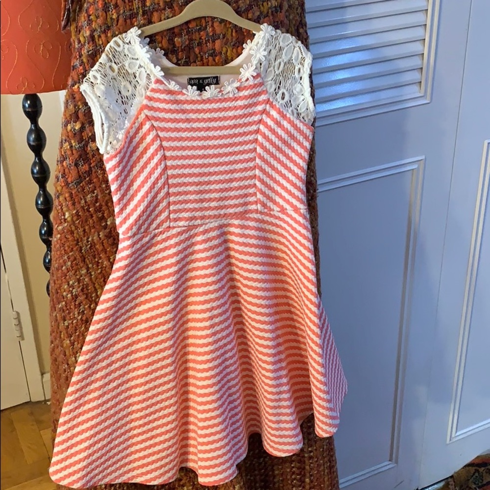 Worn once- Coral & white skater dress, floral pattern at neck in girls size 6